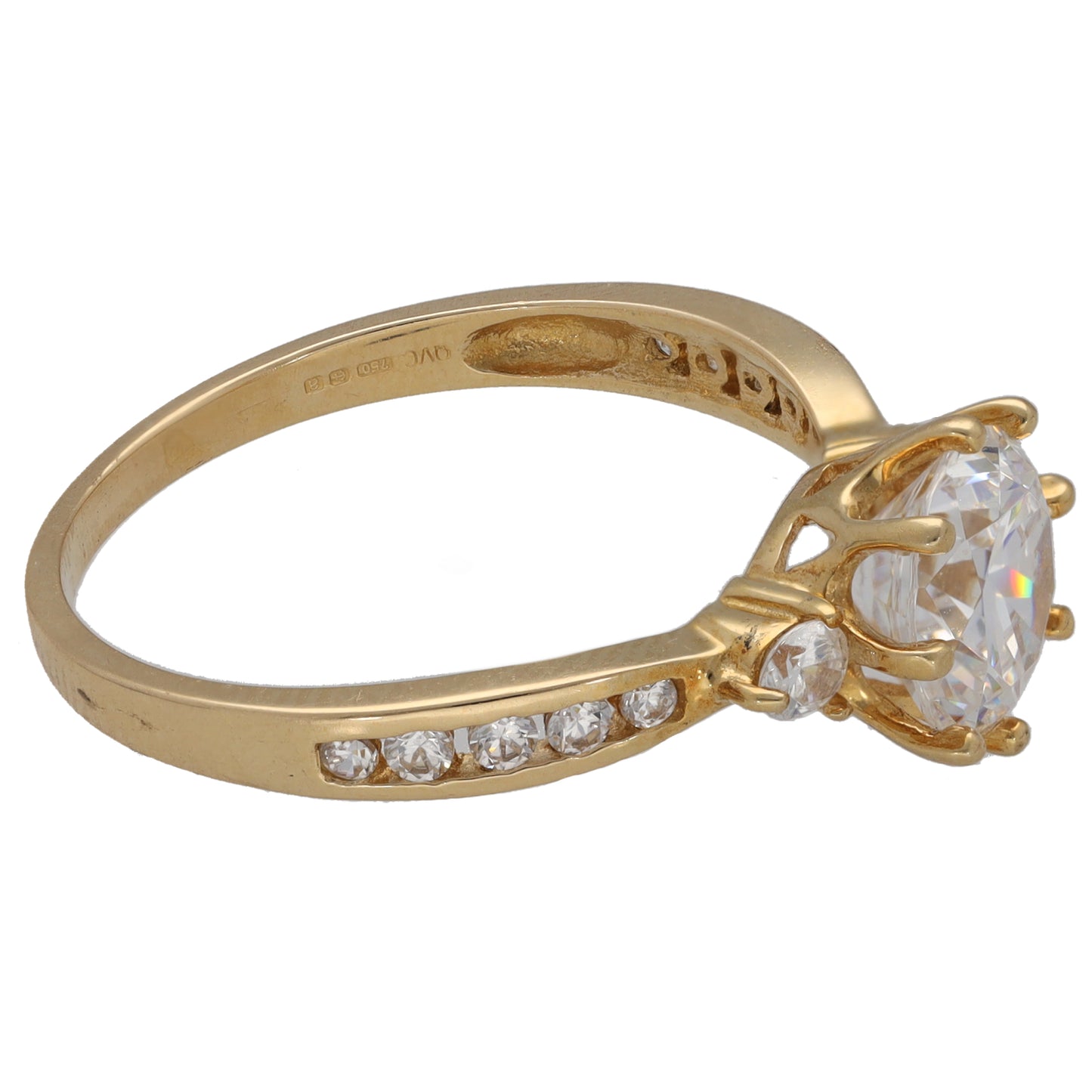 Gold-tone ring with round center CZ and side CZ accents, angled view