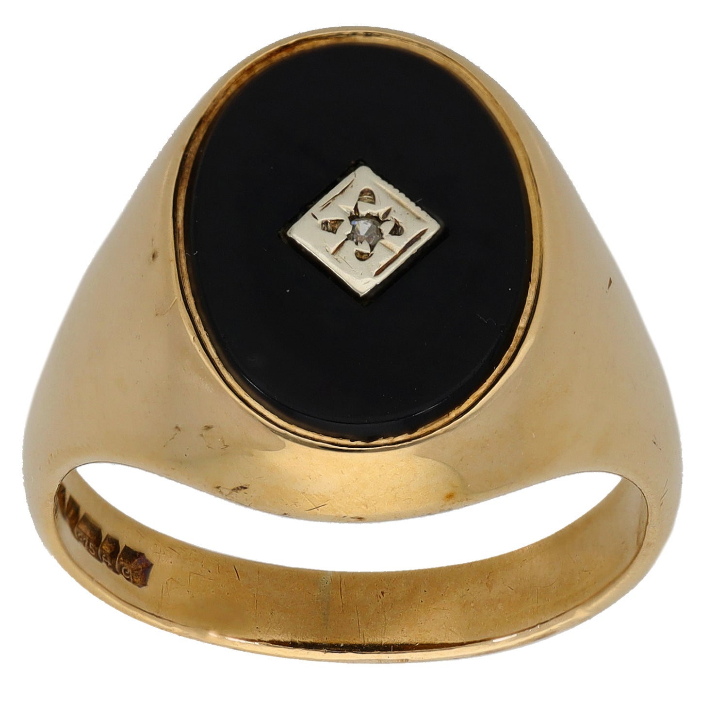 Gold signet ring with black onyx bezel and diamond-set crest