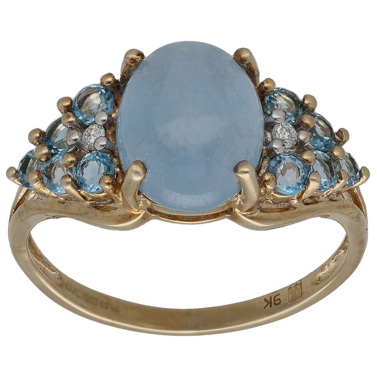 Gold cocktail ring with oval blue topaz center and diamond sparkle accents