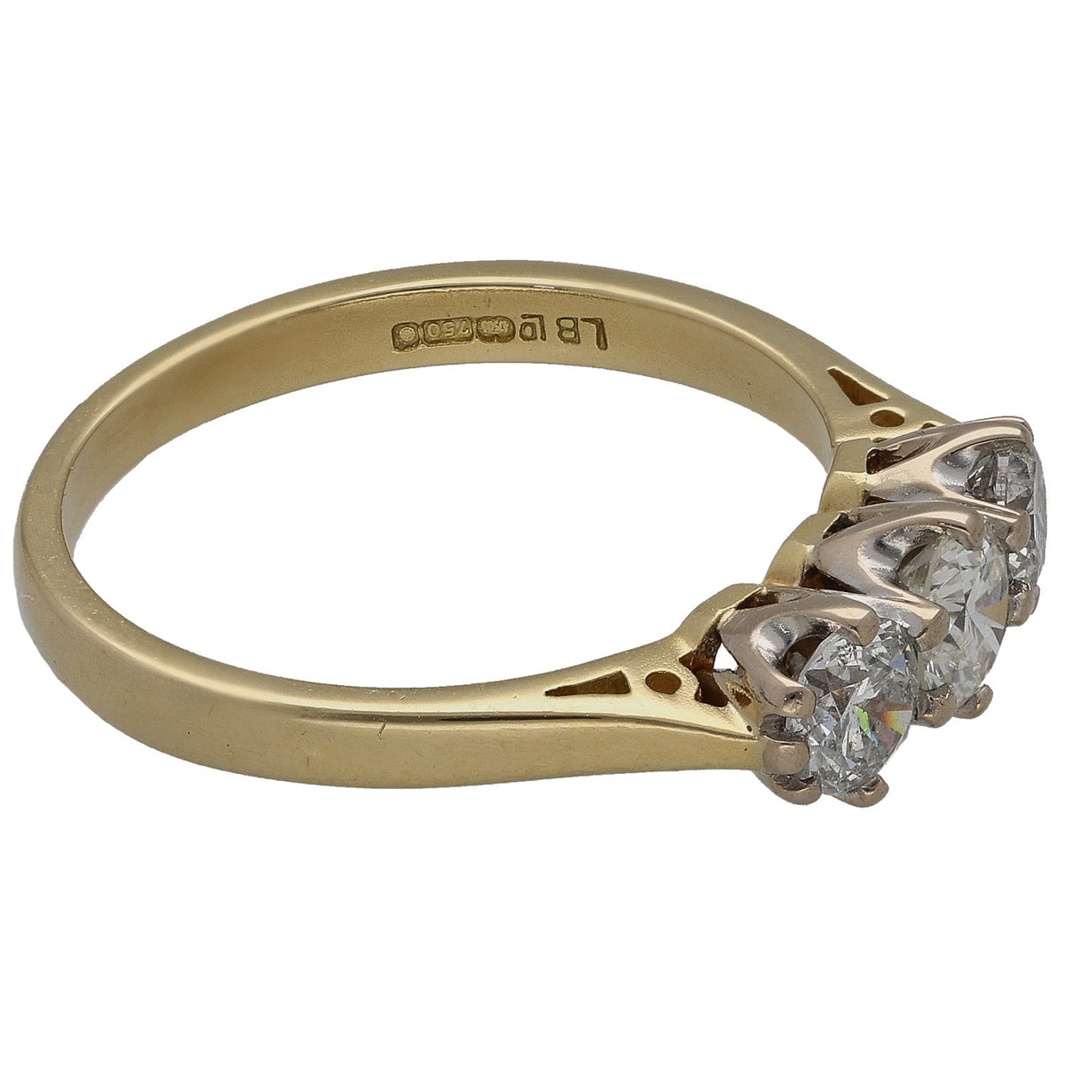 18ct gold three-stone ring with round diamonds, side profile and openwork setting