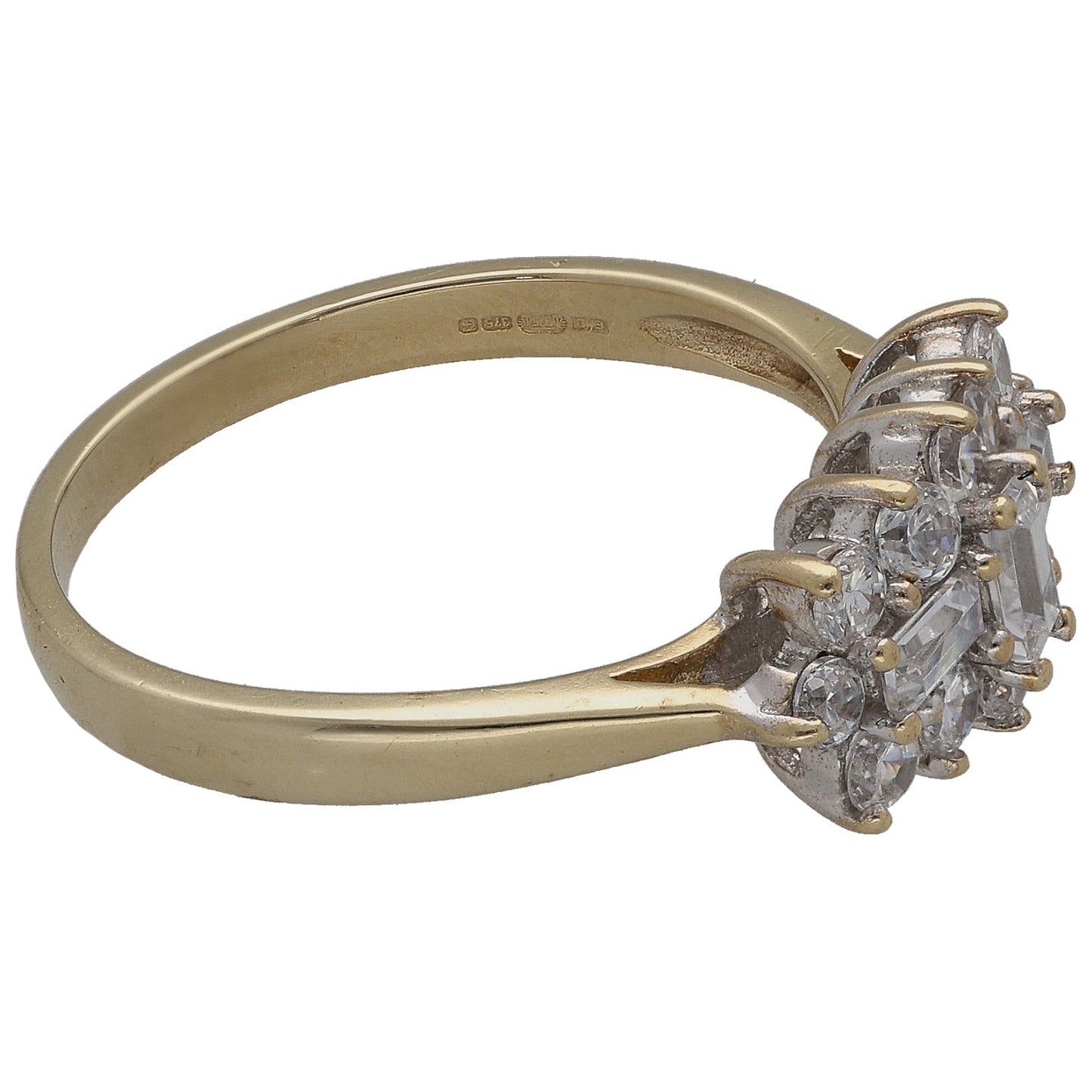 Gold-tone ring with side view of raised CZ cluster, baguette and round stones