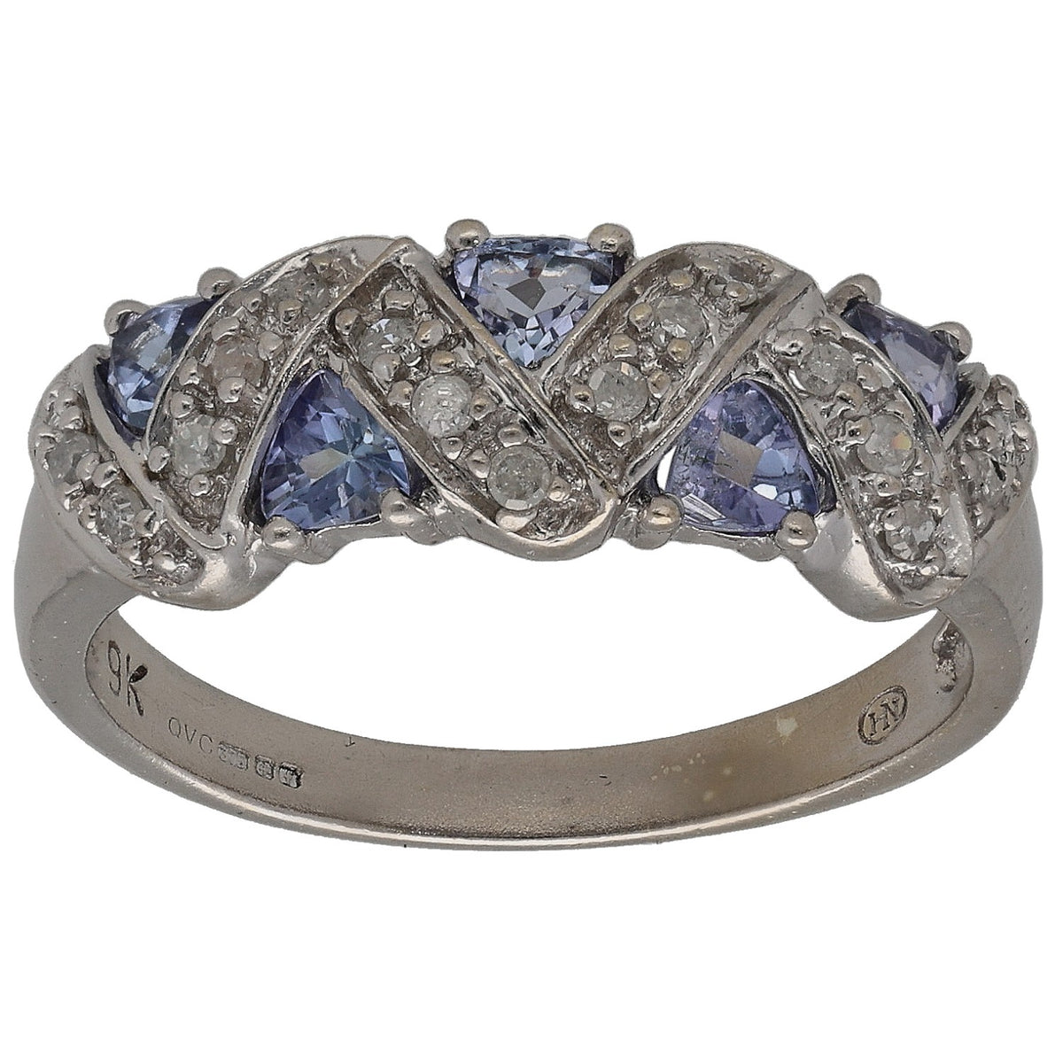 White gold ring with round blue stones and small round clear diamond accents