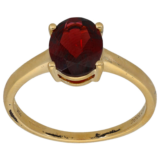9ct gold ring with oval red garnet single stone in bezel setting