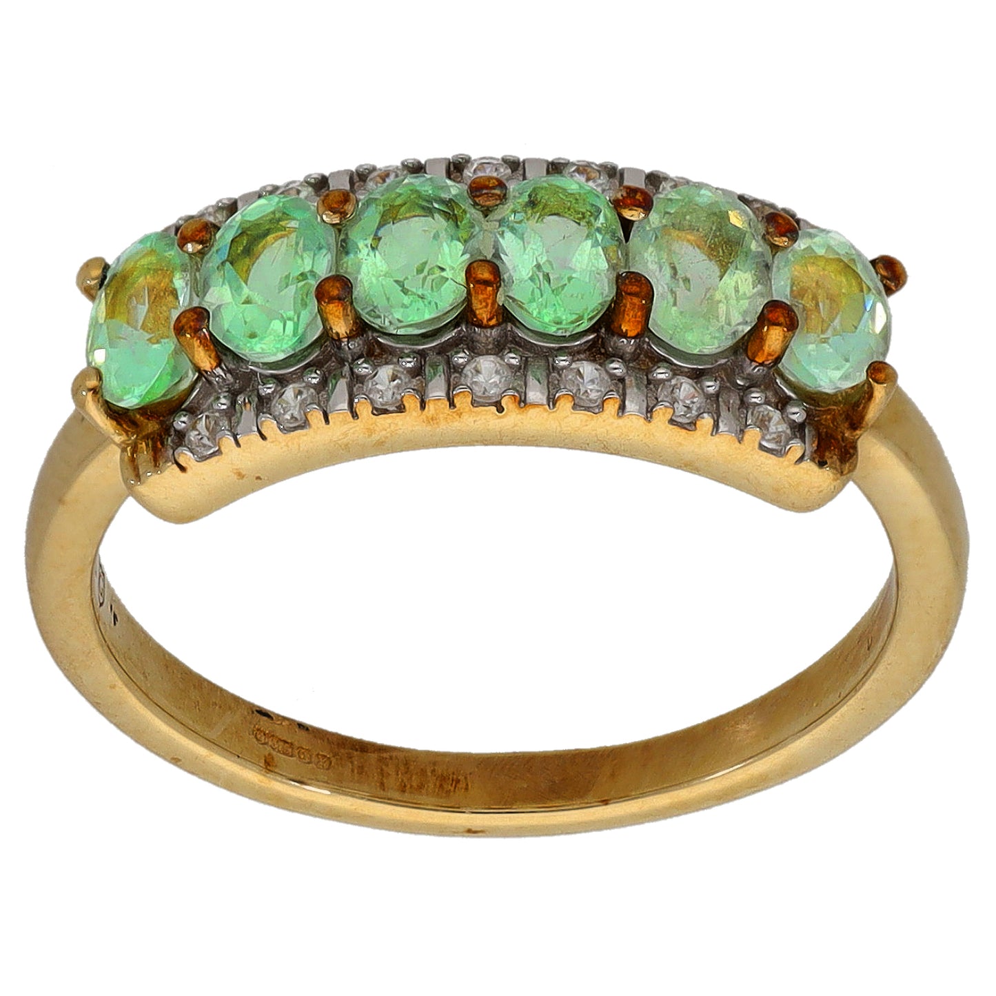 9ct gold cocktail ring, top view: row of green oval stones in silver-toned setting