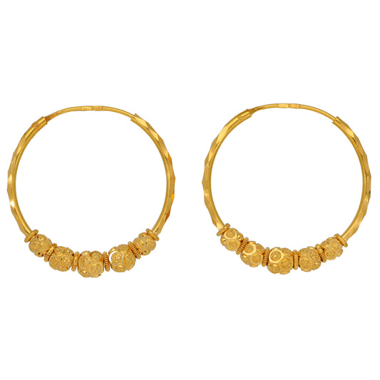Gold hoop earrings with beaded drop detail around the front edge