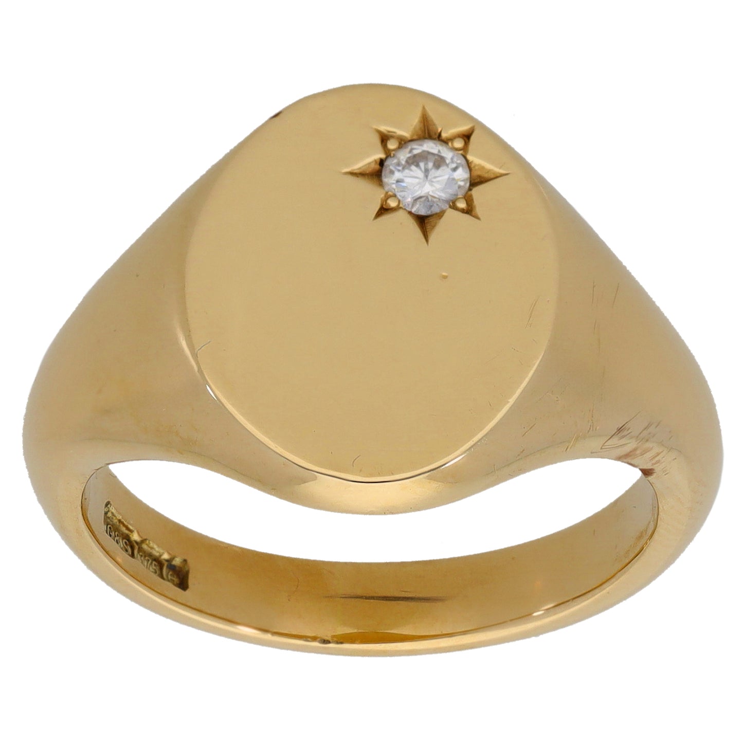 Yellow gold signet ring with round diamond in a starburst setting