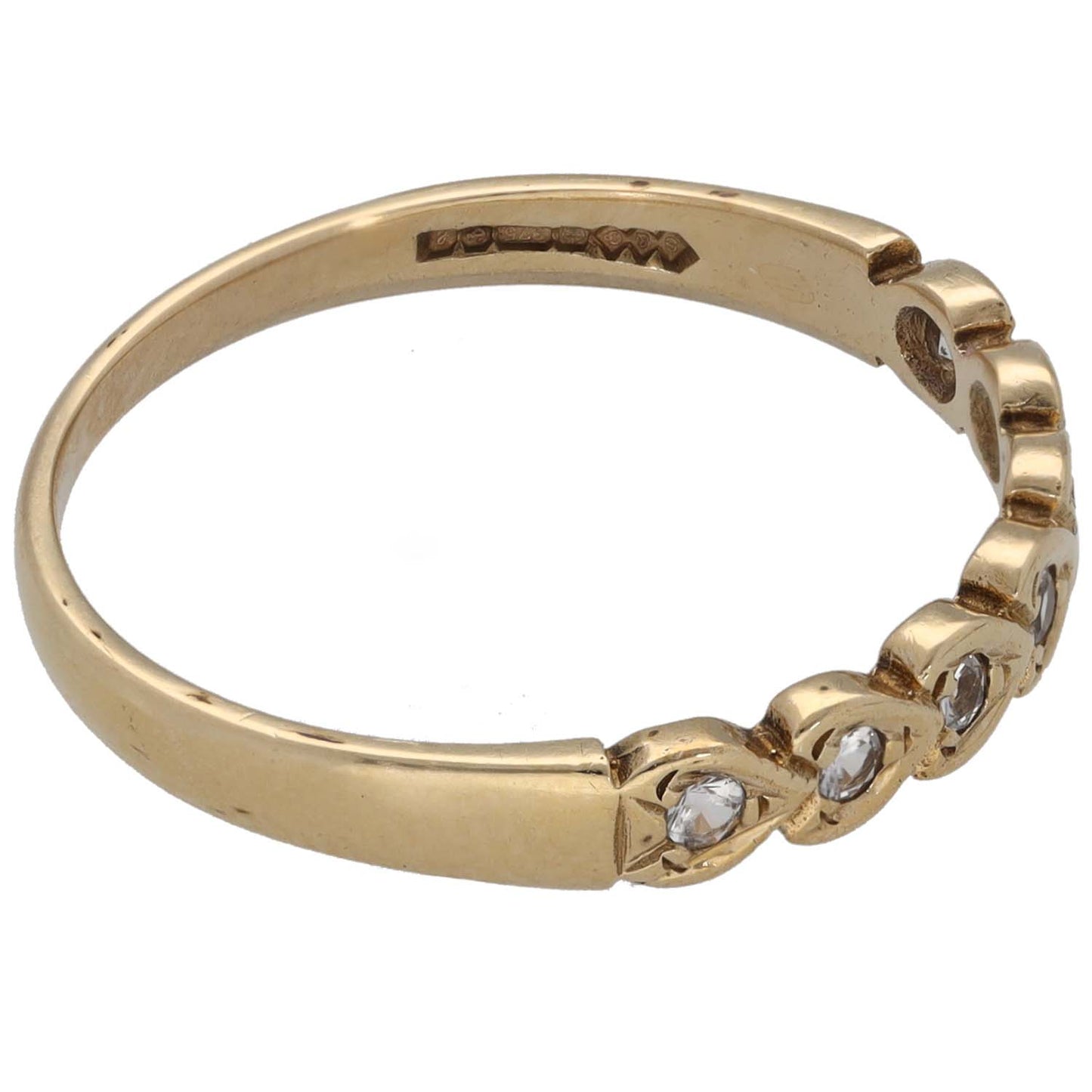 9ct gold CZ half eternity ring side view with prong-set clear stones