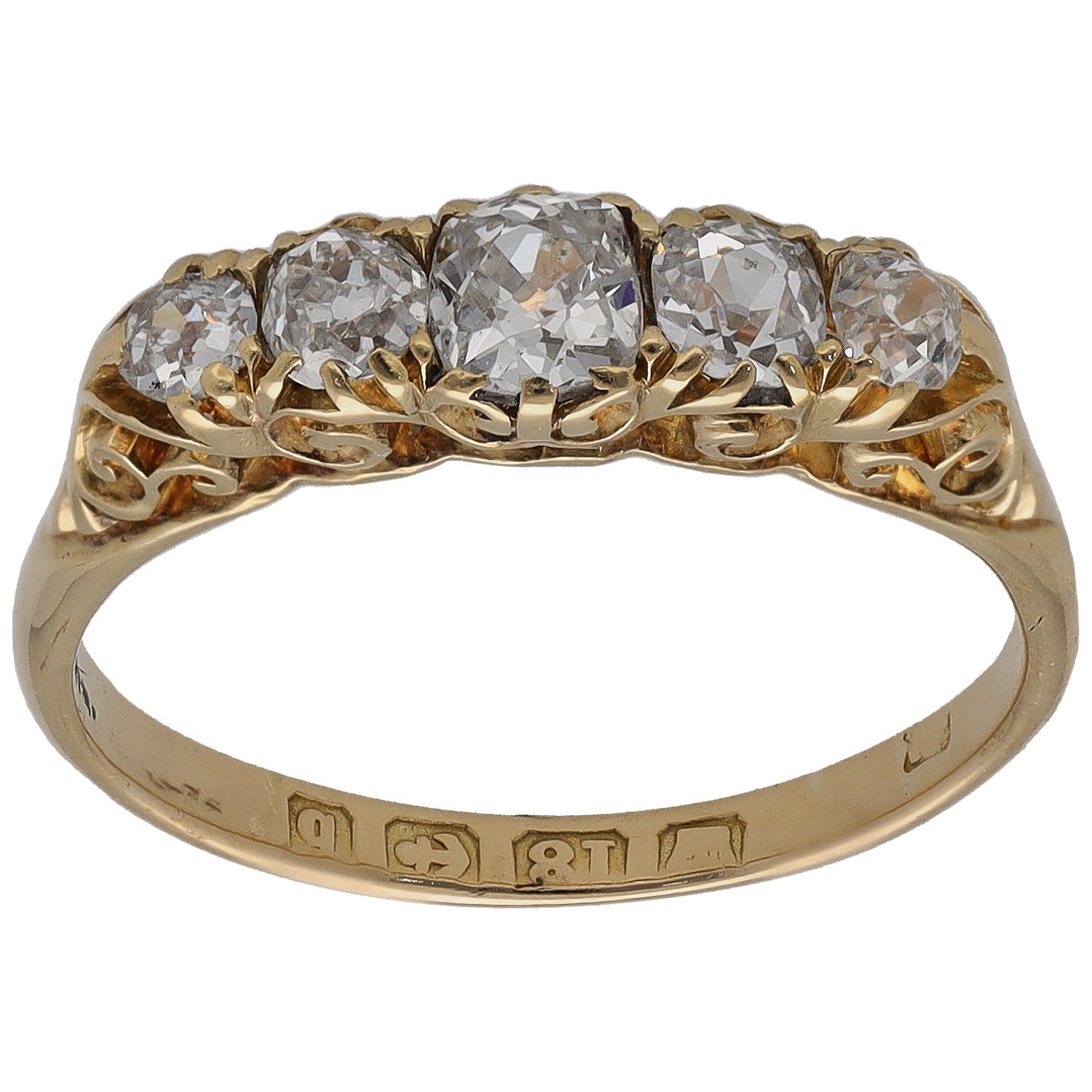 Yellow gold ring with three round diamond-like stones in a three-stone setting.
