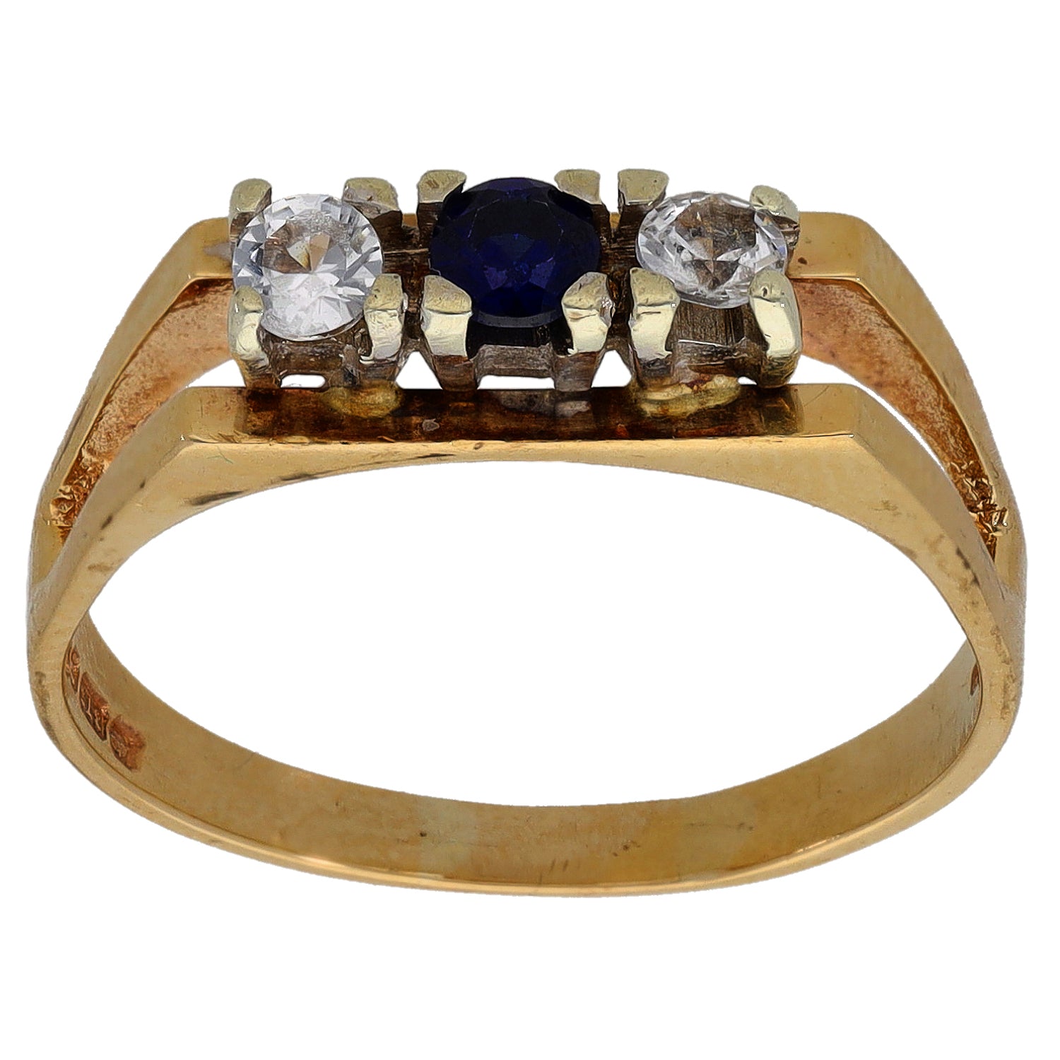 Gold-tone three-stone ring with two clear stones and a dark blue center stone