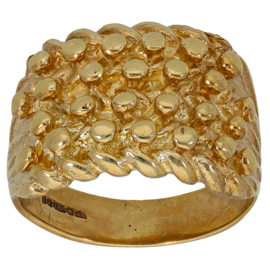 Gold keeper ring with chunky raised domes and textured cluster top