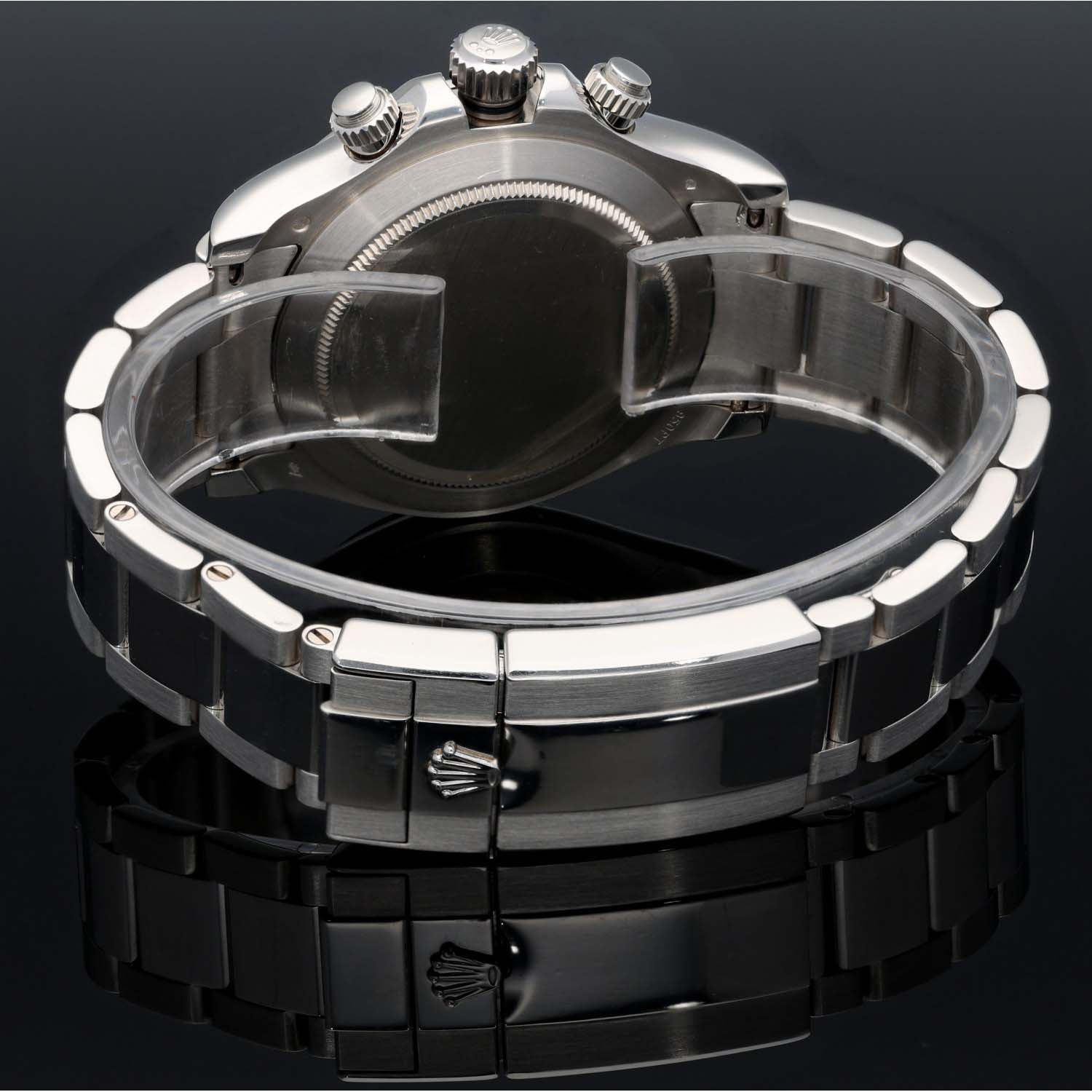 Platinum Rolex chronograph watch case back and bracelet links with crown and details