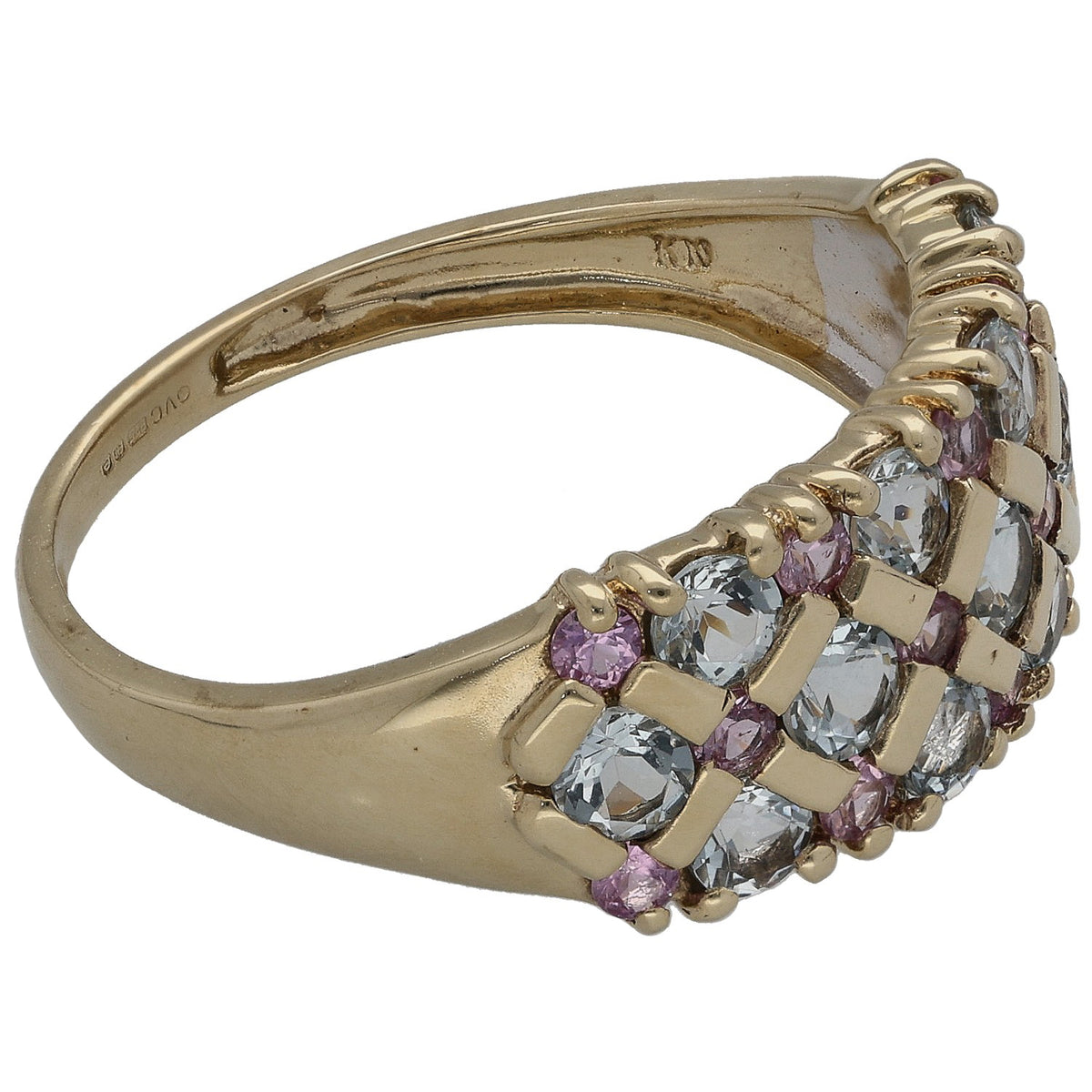 9ct gold cocktail ring with oval aquamarine-blue stones and small purple accents, side view