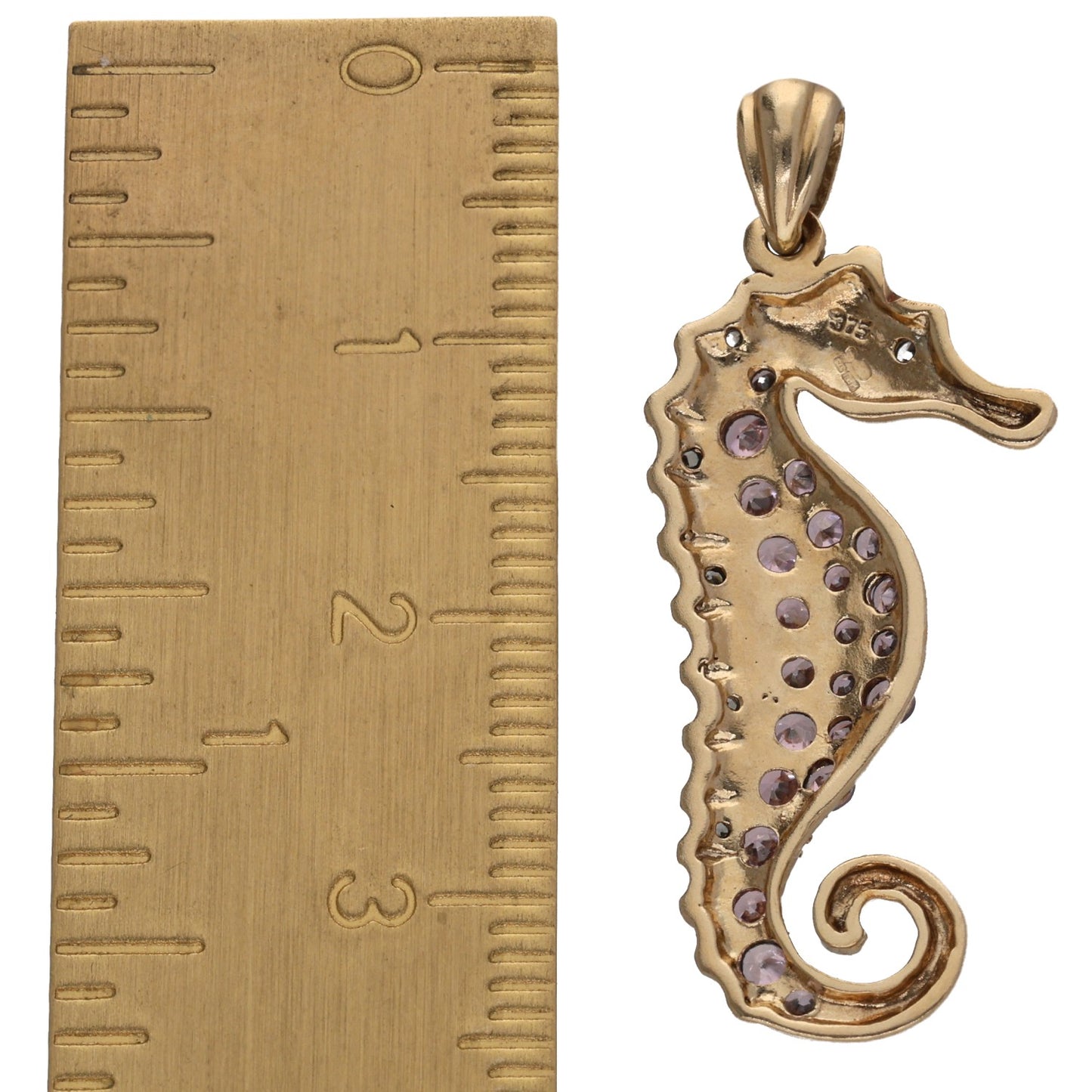 Gold seahorse pendant with purple CZ crystals, side view with bail