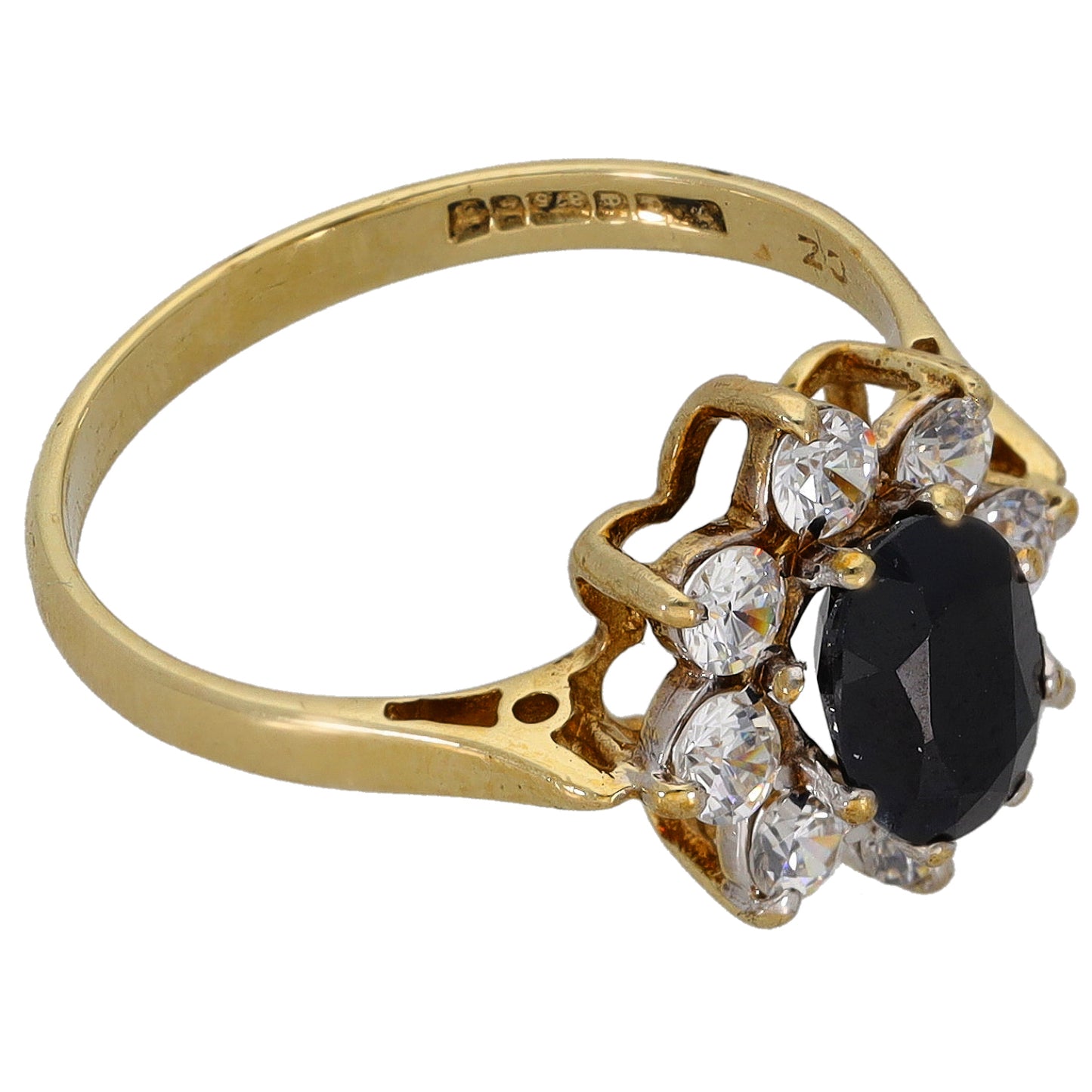 9ct gold ring band with oval black stone flanked by clear round crystals