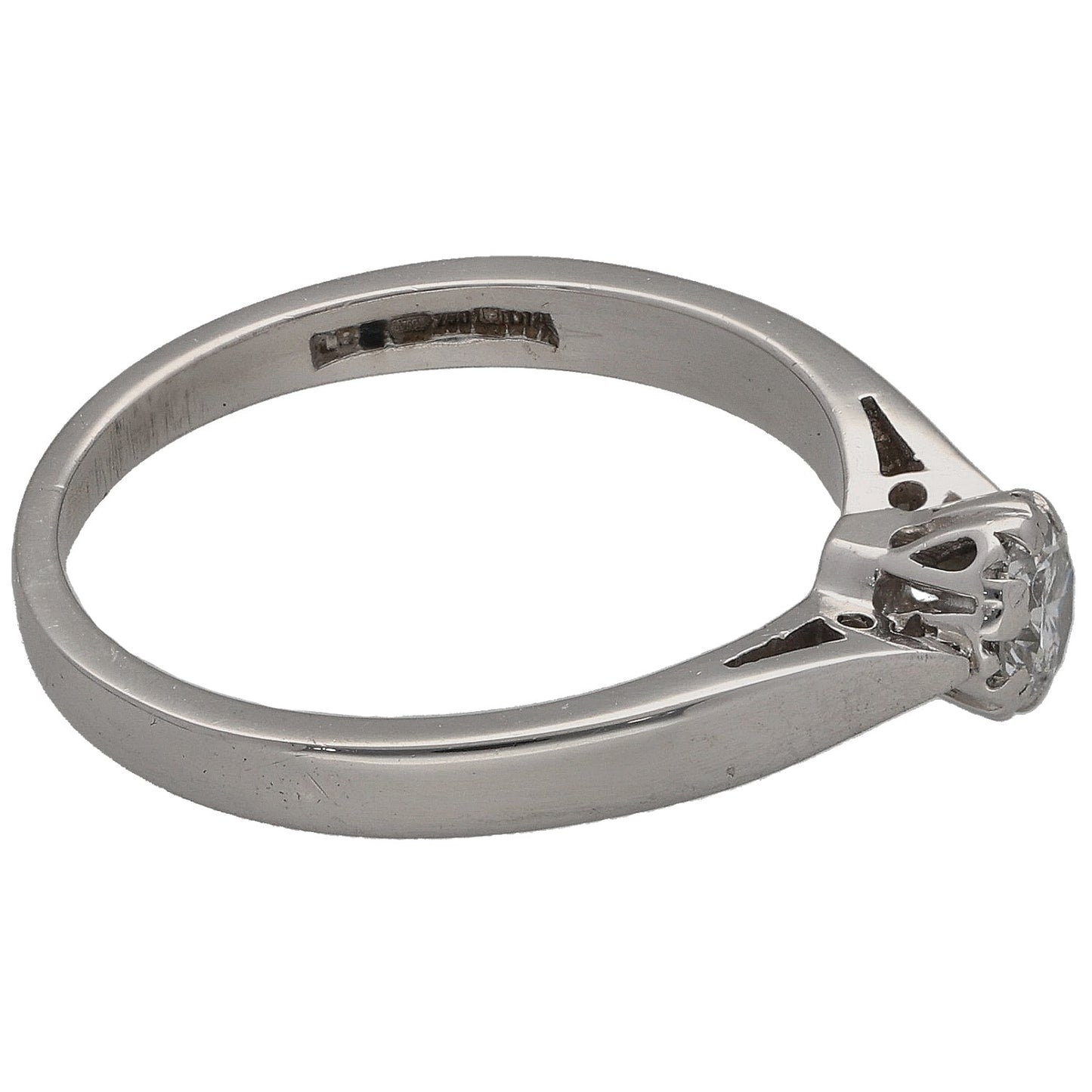 Platinum round diamond solitaire ring angled view, four-prong head on slim band