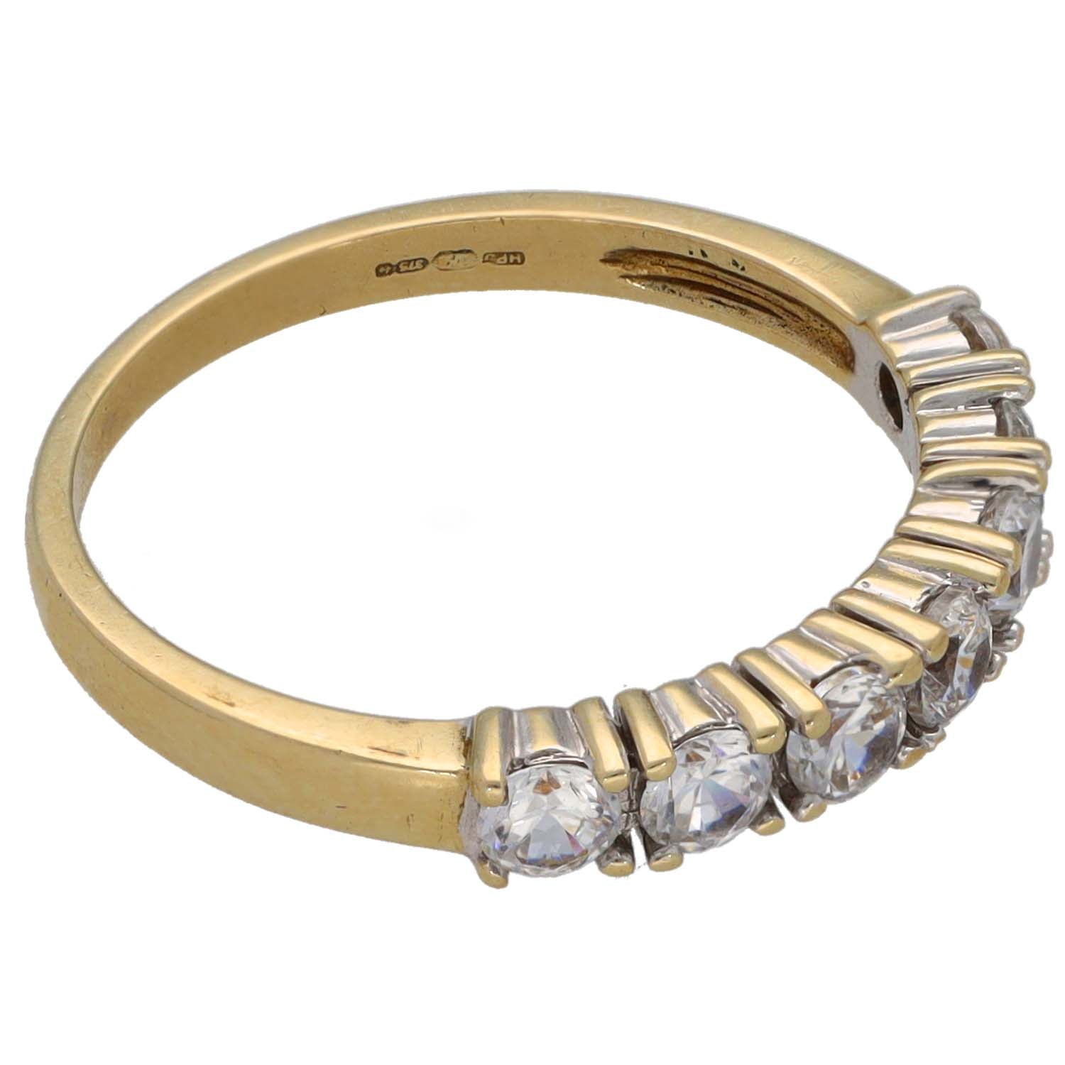 9ct gold half-eternity ring with clear CZ stones, side view of setting