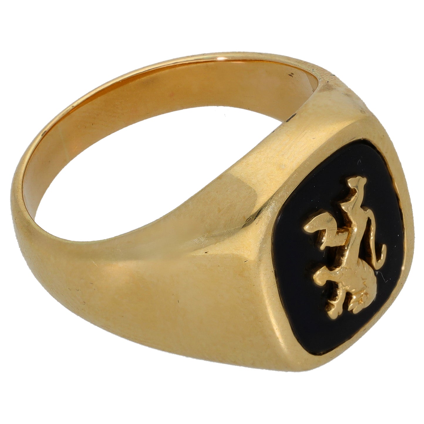 Gold signet ring with black onyx inset and gold crest emblem, angled side view