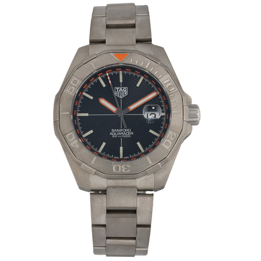Tag Heuer Aquaracer WAY208F Titanium diver watch with black dial, orange accents, and metal link bracelet