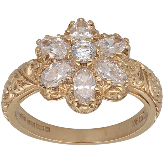 Gold-tone CZ cocktail ring with five round clear stones in a floral cluster