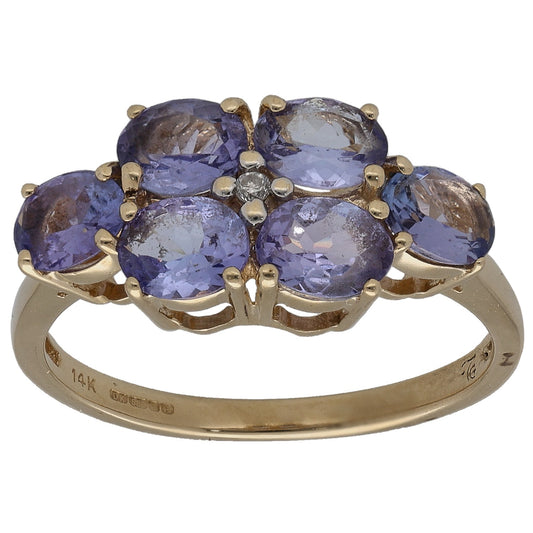 14k gold cluster ring with oval blue-violet tanzanite stones and a round diamond