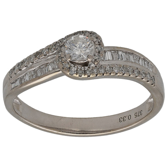 White gold diamond solitaire ring, round center stone with halo and baguette accents.