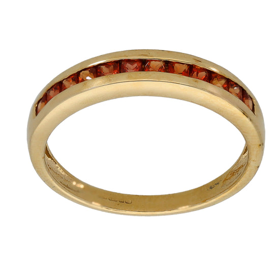 9ct gold half-eternity ring with red gemstones along the top half