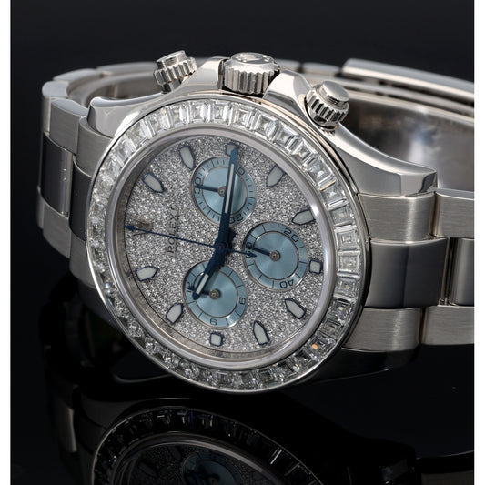 Platinum Rolex chronograph watch close-up with light blue subdials and diamond bezel