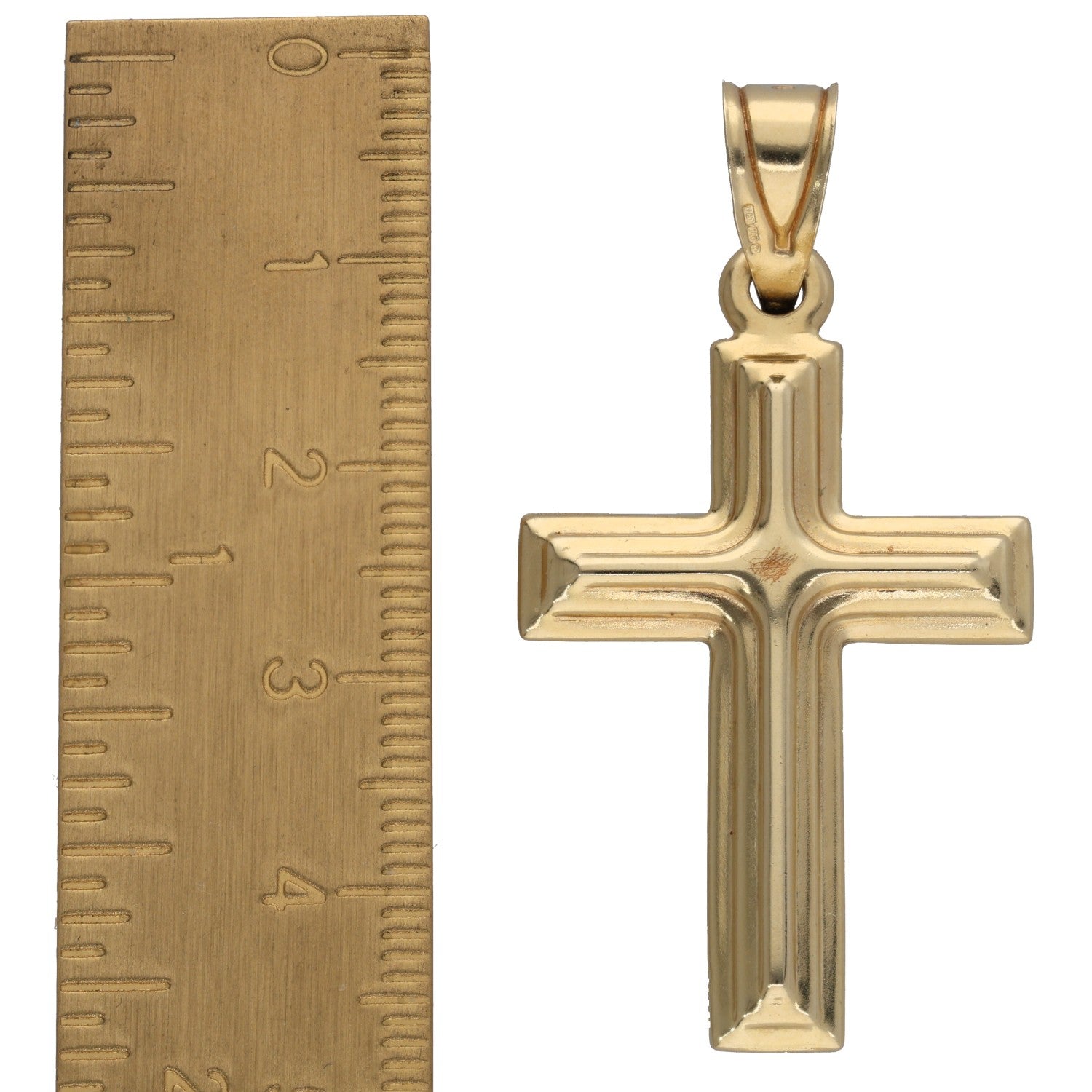14ct gold cross pendant shown with side profile beside measuring scale