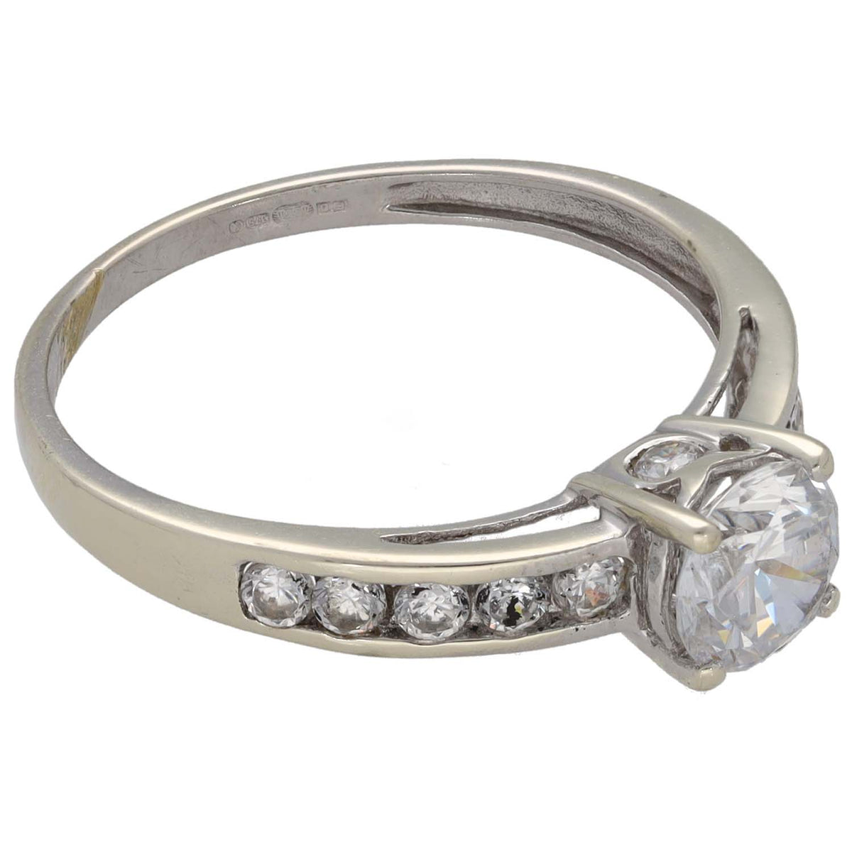 White gold CZ ring with round center stone and row of small clear accent crystals