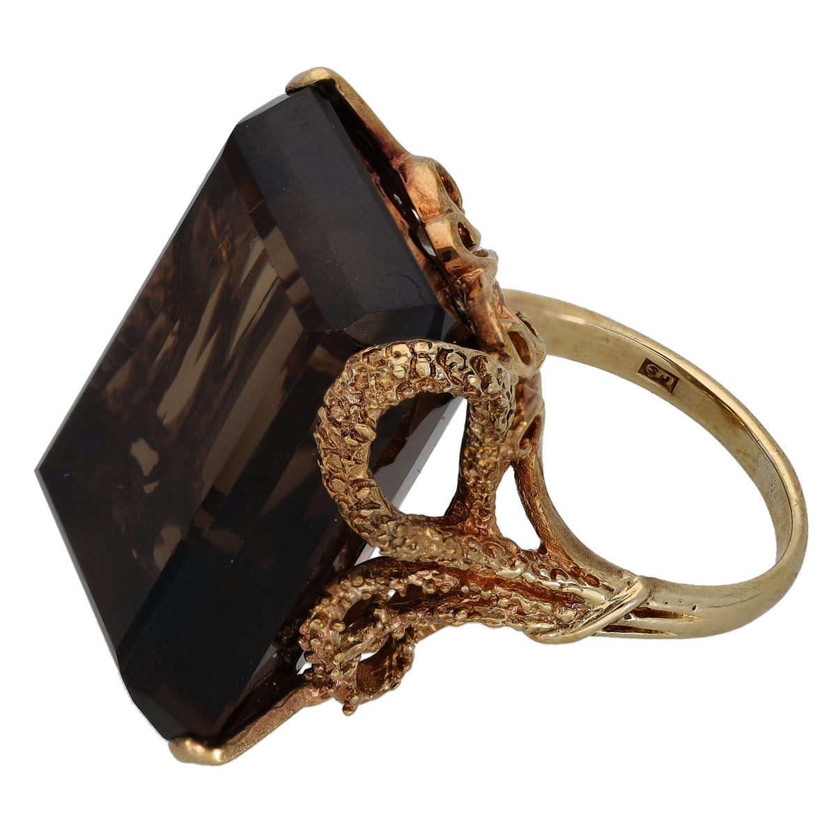 Gold smoky quartz ring with openwork filigree mounting and prominent rectangular stone