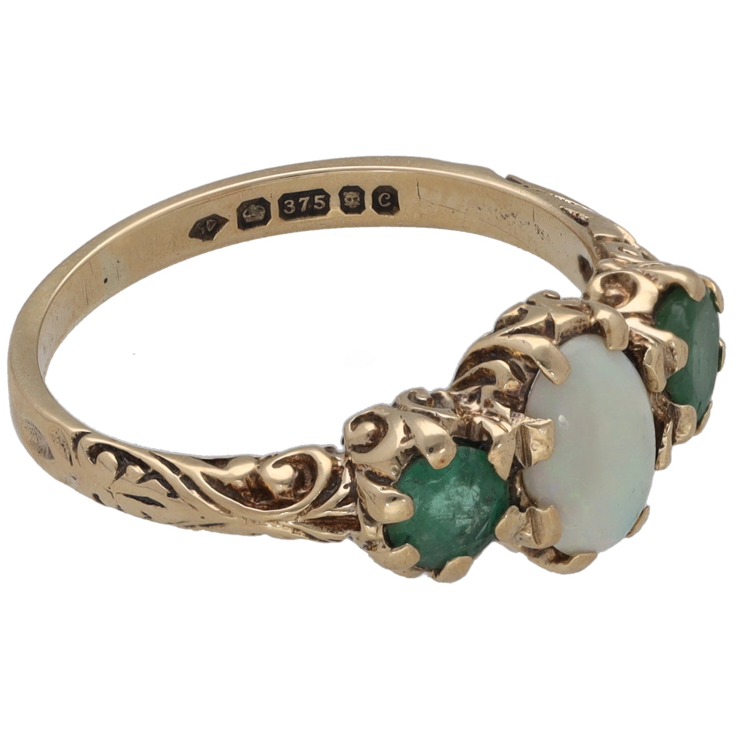 Gold ring side view with emerald and opal stones in carved floral setting, size L
