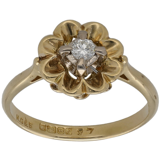 18ct gold diamond solitaire ring with round center stone, flower-like halo setting