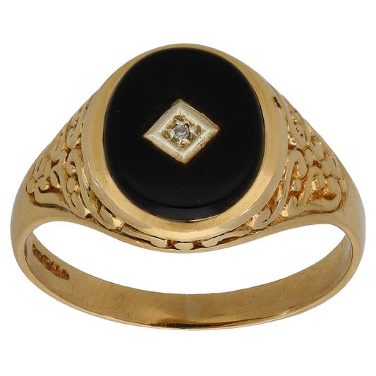 Gold signet ring, black onyx oval face with square diamond cluster center
