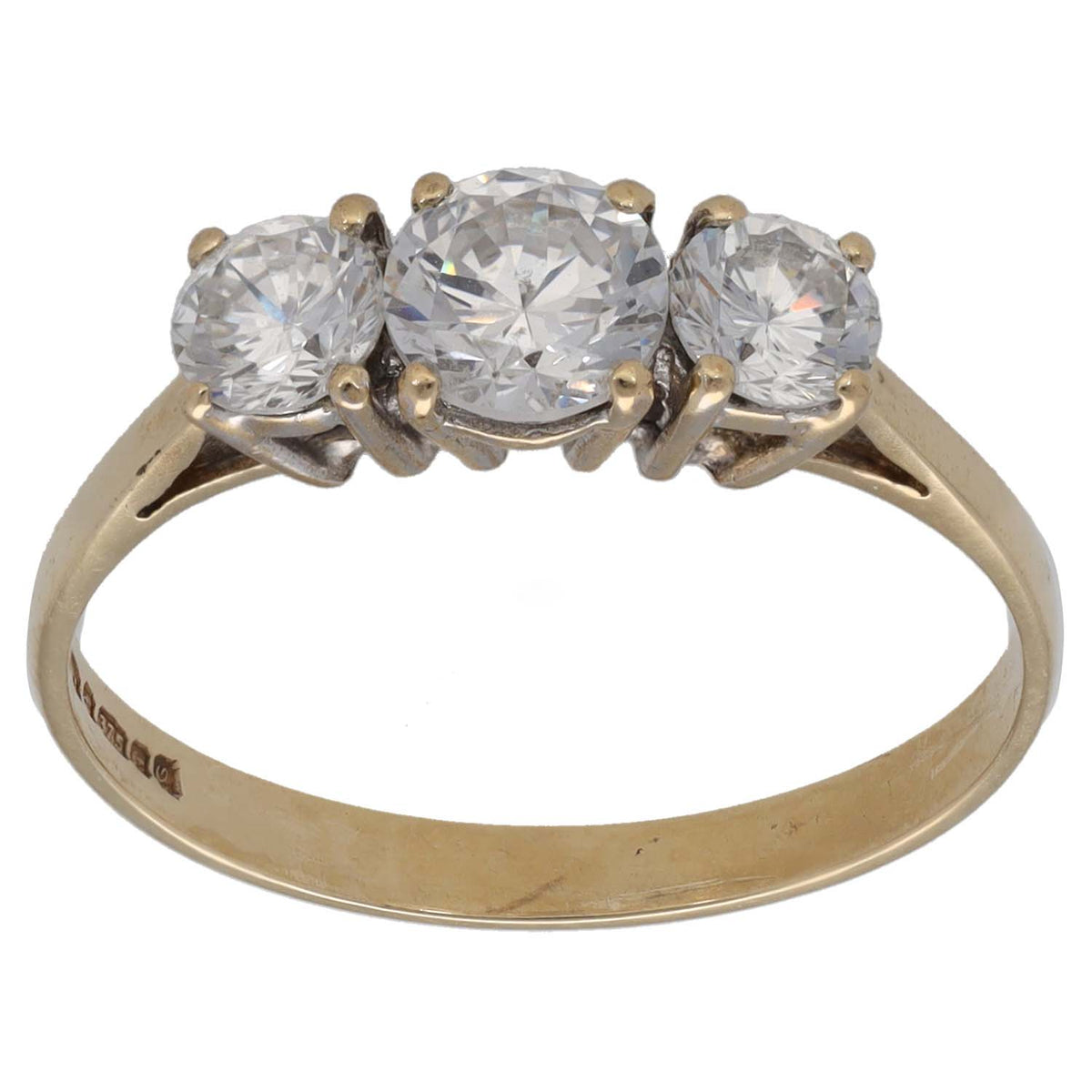 Gold-tone three-stone CZ ring with three round clear stones on a slim band