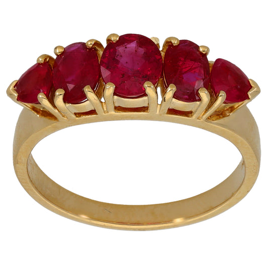 Gold half eternity ring with five large red gemstone settings across the band