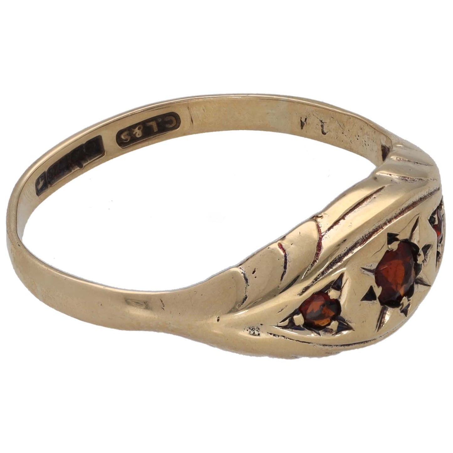 Gold three-stone ring band with marquise garnets and engraved detailing
