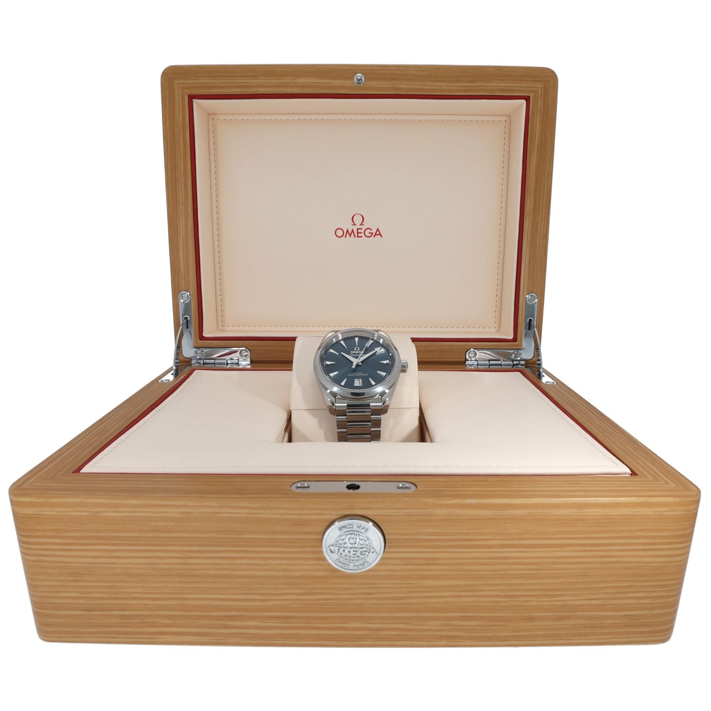 Stainless steel Omega Seamaster 220.10.38.20.03.003 watch with blue dial resting in a wood presentation box