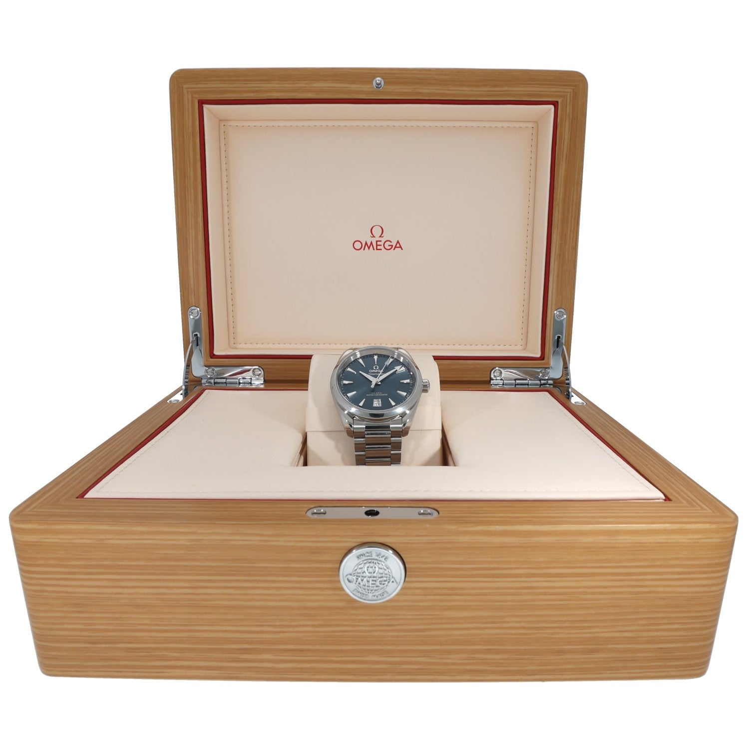 Stainless steel Omega Seamaster 220.10.38.20.03.003 watch with blue dial resting in a wood presentation box