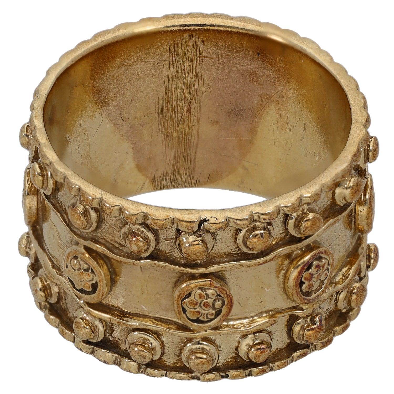 9ct gold wedding ring band with raised circular pattern around the outer edge, side view
