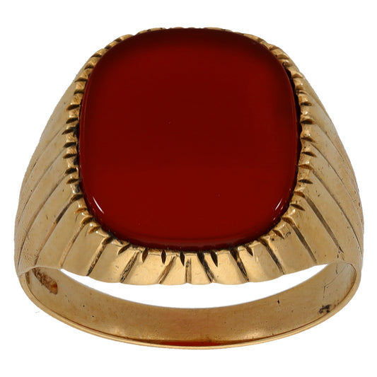 Gold signet ring with bezel-set round red carnelian, front view