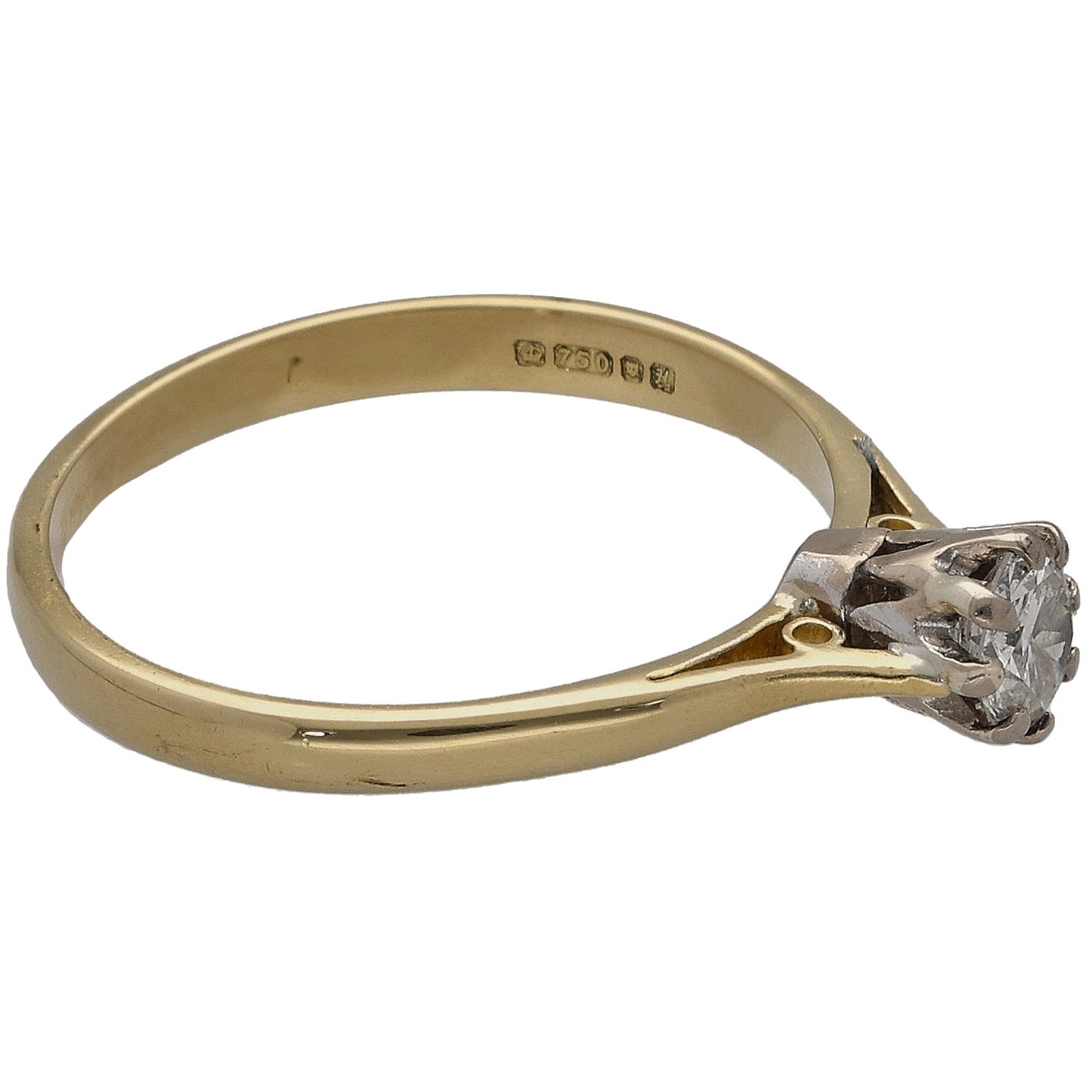 Gold ring featuring round diamond solitaire and engraved inner hallmark on band