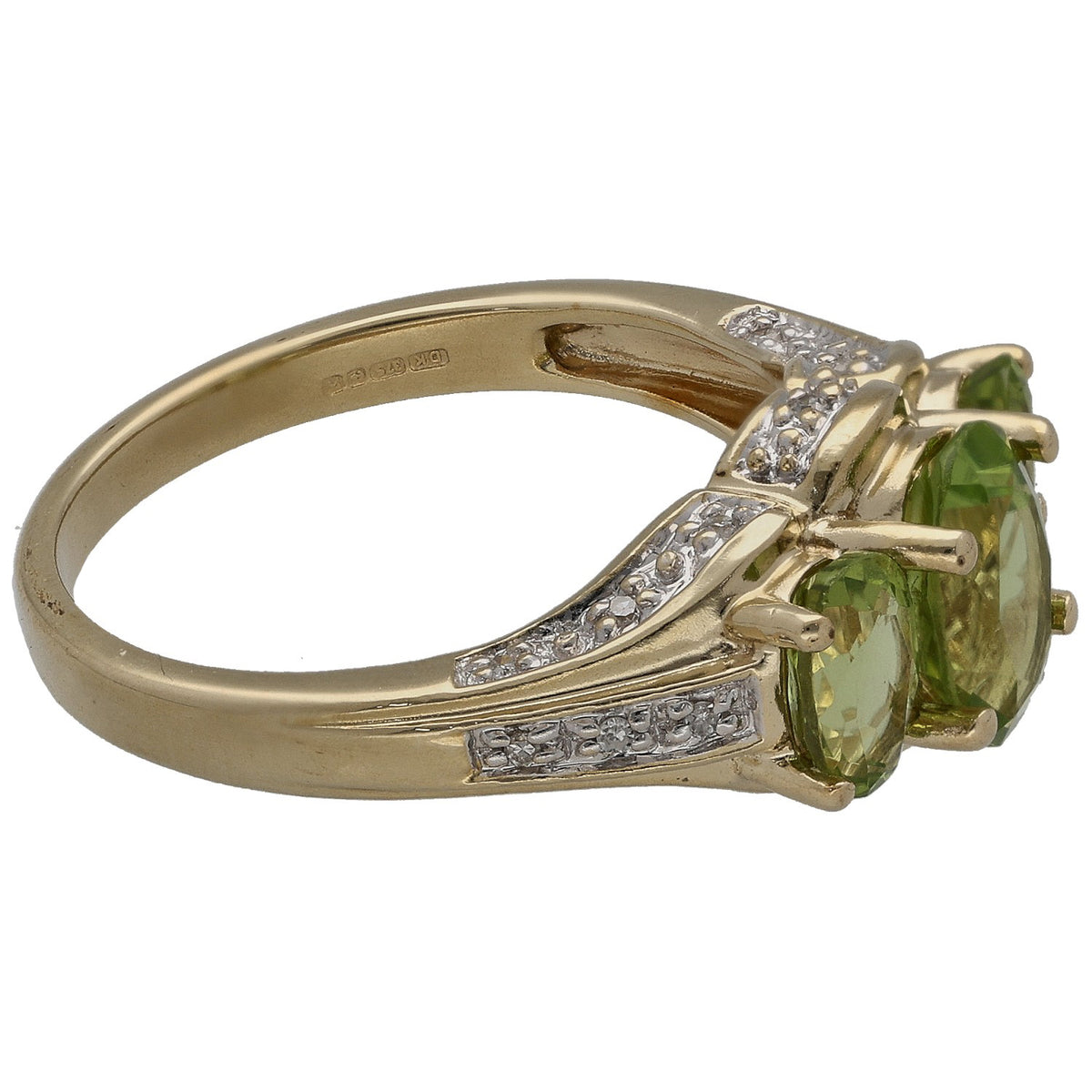 9ct gold peridot and diamond dress ring with three green stones