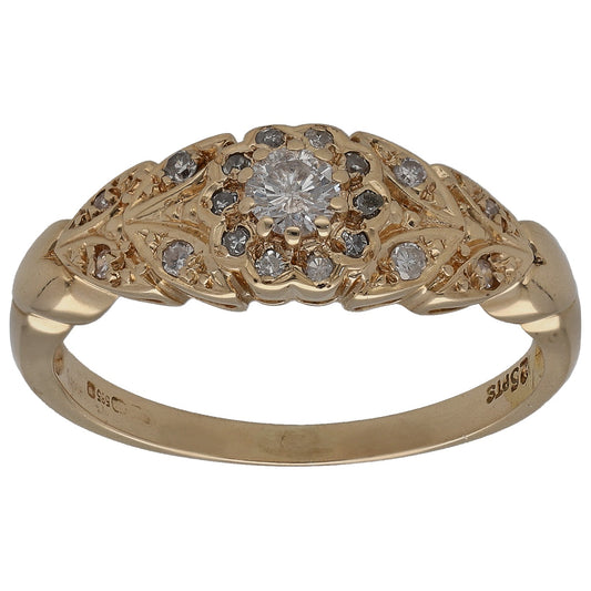 14k gold round diamond cocktail ring with clustered halo and small dark stones