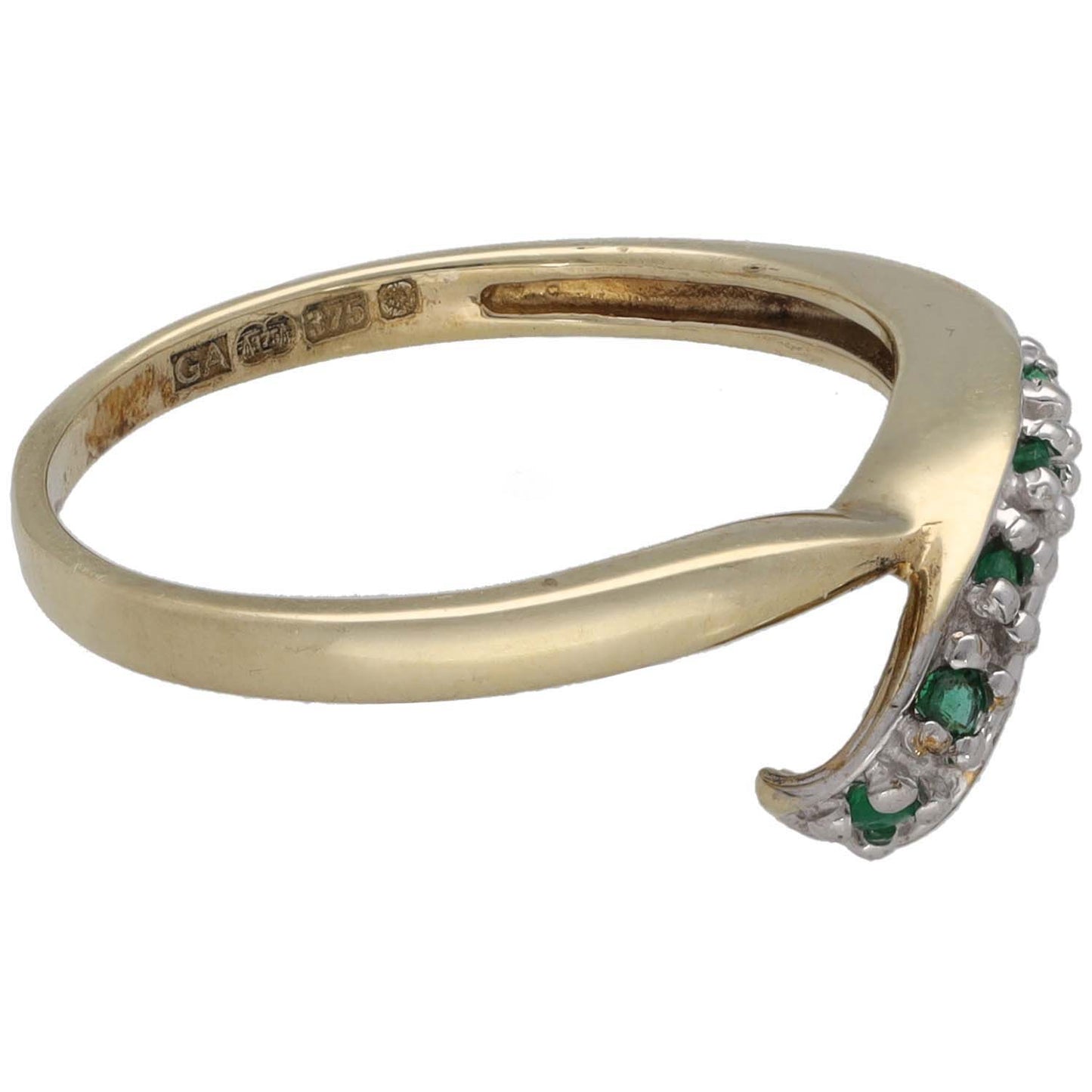 9ct gold ring with green emerald stones on one side, curved metal band
