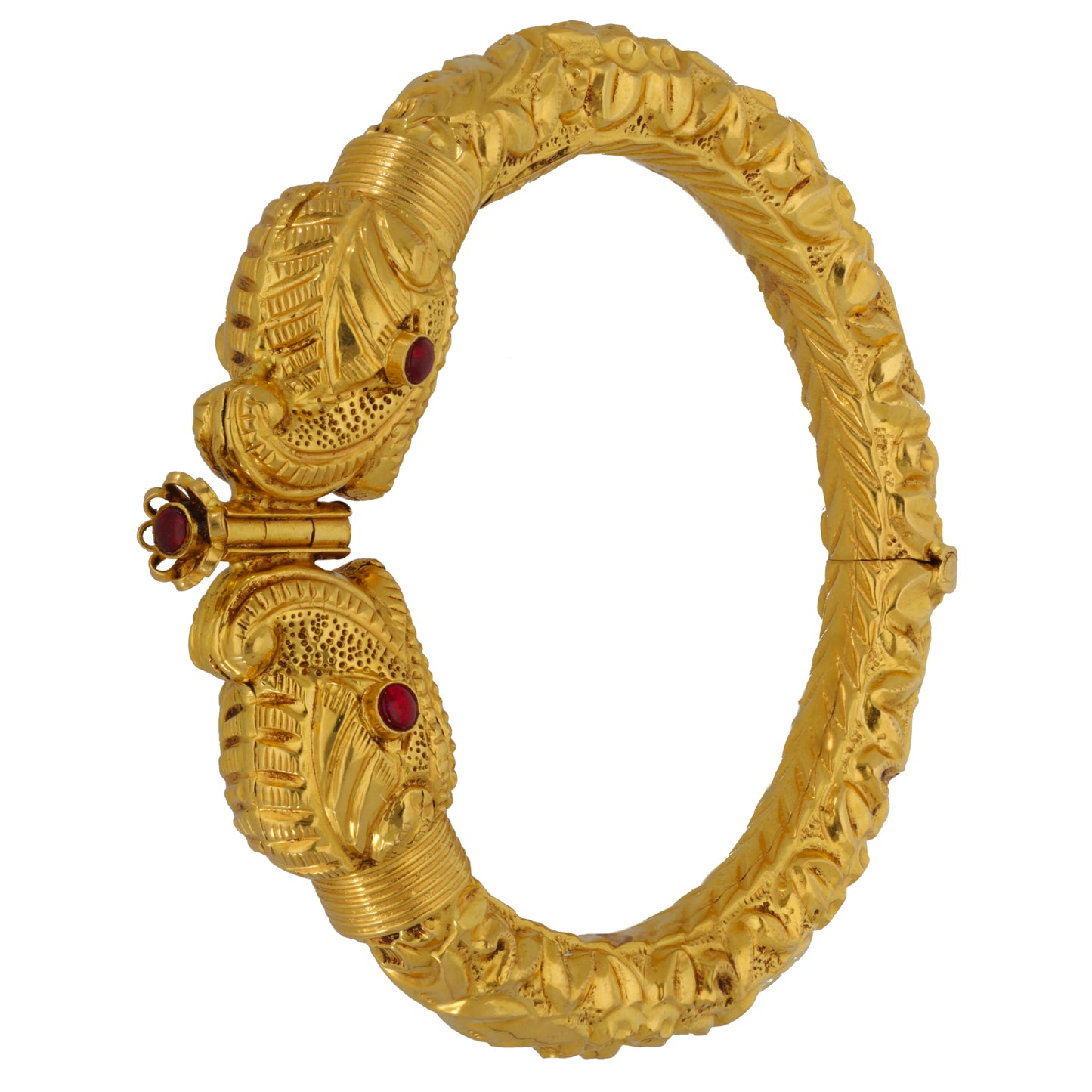 22ct Gold-tone hinged bangle with detailed carvings and red stones near clasp hinge