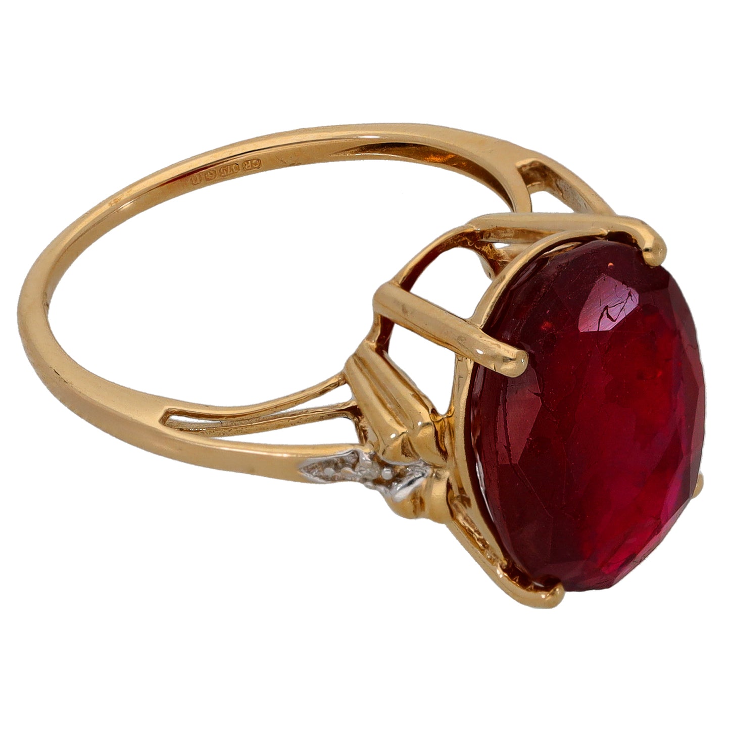 9ct gold ring with marquise-oval ruby side setting and small round diamond accents