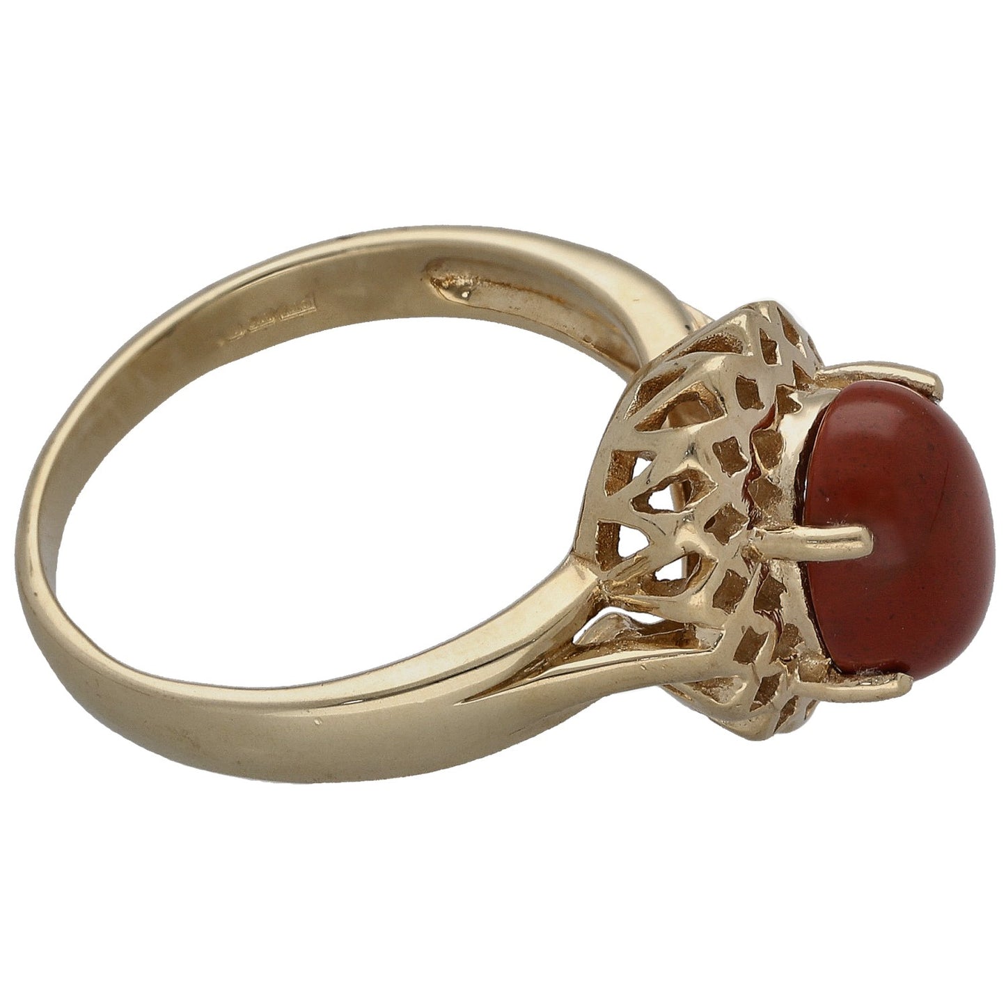 Gold ring featuring red carnelian set in decorative square cutout prongs