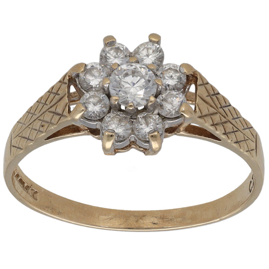 Gold tone cluster ring with five clear CZ stones in a flower setting, size N