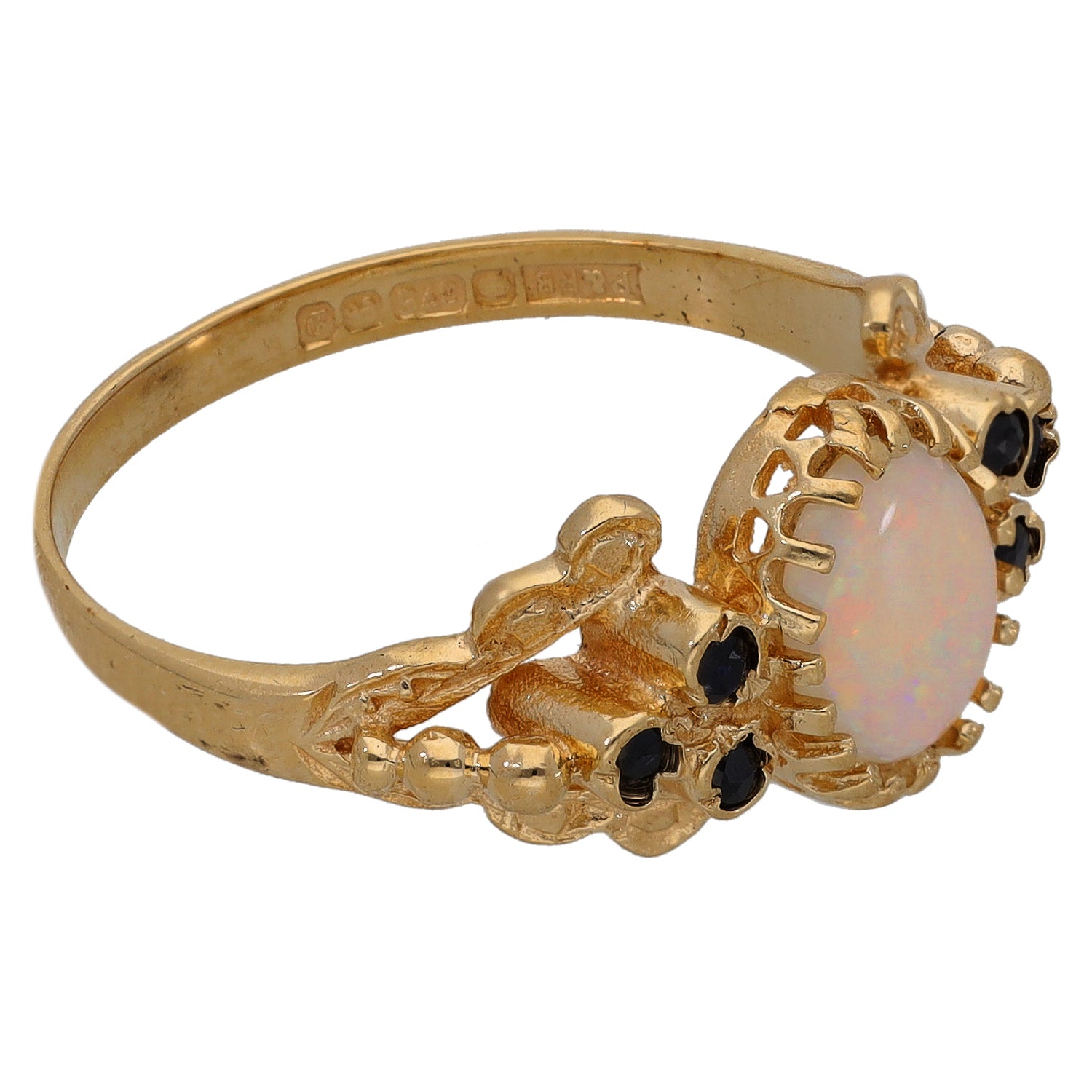 9ct gold ring with oval opal center and dark sapphire accent stones, size Q