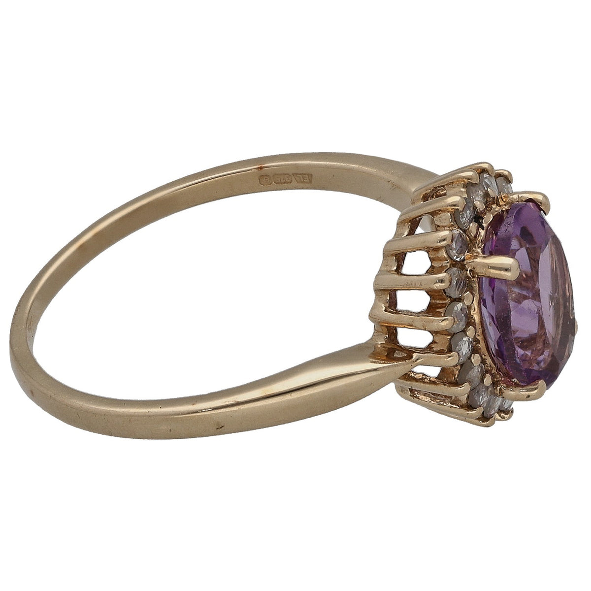 Gold solitaire ring side view: oval amethyst with raised diamond accents, size M
